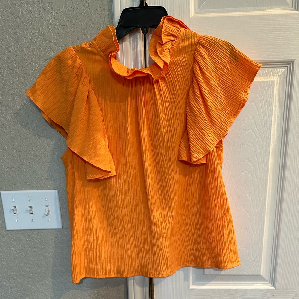 Ladies Ruffled orange blouse size medium